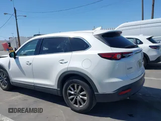 2019 Mazda CX-9 Touring with VIN JM3TCACY5K0306424, listed as a IAAI auction lot 42150466 with 95,166 mi miles and . Bid and sale history available at DreamBid. Image 14.