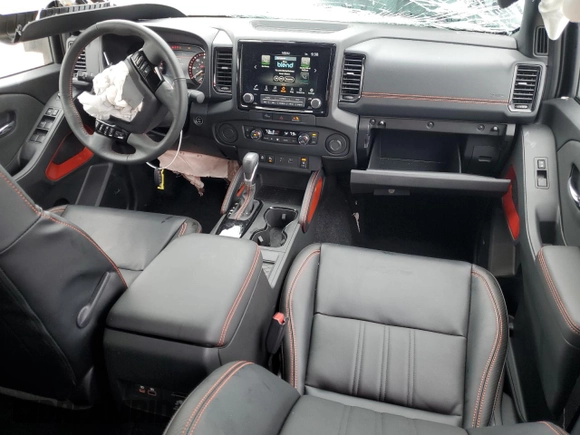 2024 Nissan Frontier Pro-X z VIN 1N6ED1EJ2RN605409, wystawiony jako Copart lot #85559674 z przebiegiem 6 850 mil mil oraz Nie do naprawy • Non repairable. Historia ofert i sprzedaży dostępna na DreamBid. Obrazek 8.