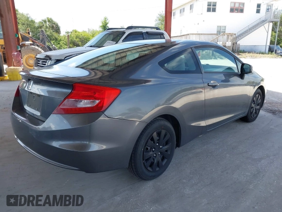 2012 Honda Civic Cpe LX with VIN 2HGFG3B52CH500405, listed as a IAAI auction lot 42091494 with 209,657 mi miles. Bid and sale history available at carsss.com. Image 4.