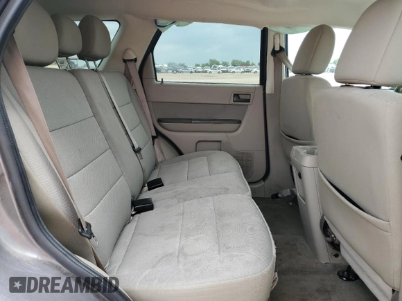 2010 Ford Escape XLT с VIN 1FMCU0D72AKD21676, выставлен на аукционе Copart как лот 55268255 с пробегом 172 355 миль миль и Списание • Salvage title. История ставок и продаж доступна на DreamBid. Изображение 10.