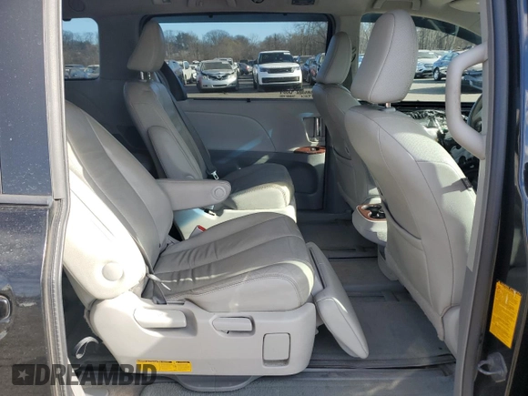 2014 Toyota Sienna Limited z VIN 5TDDK3DC5ES083494, wystawiony jako Copart lot #88325745 z przebiegiem 130 476 mil mil oraz Szkoda całkowita • Salvage title. Historia ofert i sprzedaży dostępna na DreamBid. Obrazek 11.