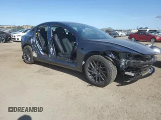 2025 Tesla Model 3 Long Range with VIN 5YJ3E1EA4SF978477, listed as a Copart auction lot 58525905 with 1,531 mi miles and Salvage title. Bid and sale history available at DreamBid. Image 4.