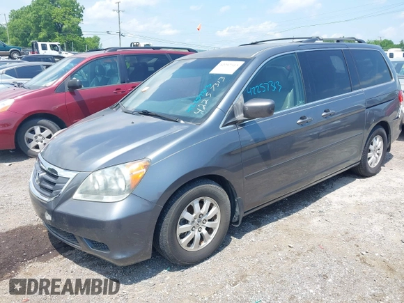 2010 Honda Odyssey EX with VIN 5FNRL3H42AB110879, listed as a IAAI auction lot 42257313 with 197,190 mi miles and . Bid and sale history available at DreamBid. Image 2.