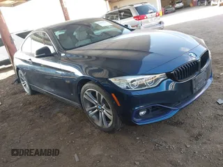 2015 BMW 4 Series 428i xDrive with VIN WBA3N5C56FK484625, listed as a IAAI auction lot 41419970 with 63,765 mi miles. Bid and sale history available at carsss.com. Image 1.