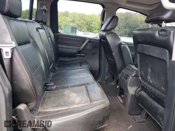 2011 Nissan Titan Pro-4X with VIN 1N6BA0EC6BN313680, listed as a Copart auction lot 60335995 with 241,301 mi miles and Salvage title. Bid and sale history available at DreamBid. Image 10.