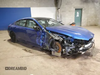 2024 BMW 8 Series M850i z VIN WBAGV8C07RCP90030, wystawiony jako Copart lot #53668245 z przebiegiem Nie podano mil oraz Szkody całkowita. Historia ofert i sprzedaży dostępna na DreamBid. Obrazek 4.