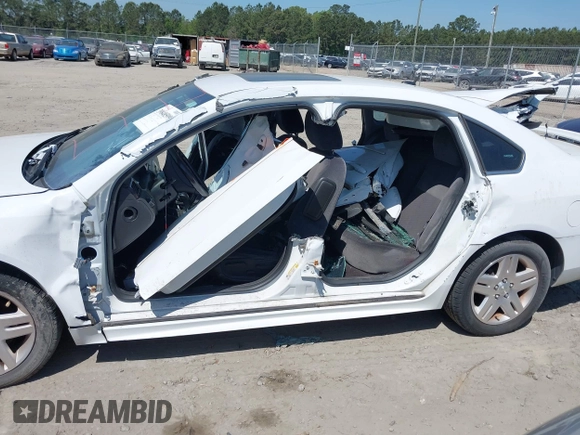 2014 Chevrolet Impala LT with VIN 2G1WB5E30E1136153, listed as a IAAI auction lot 39848599 with 126,676 mi miles and . Bid and sale history available at DreamBid. Image 6.
