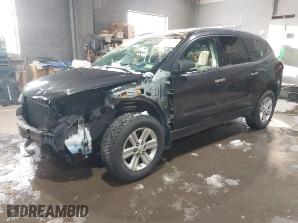 2013 Chevrolet Traverse LT with VIN 1GNKVGKD1DJ159409, listed as a IAAI auction lot 41591916 with 222,079 mi miles and . Bid and sale history available at DreamBid. Image 2.