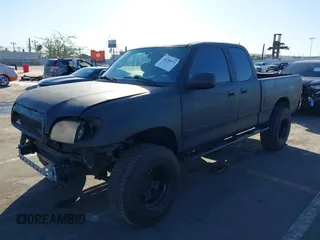 2000 Toyota Tundra SR5 with VIN 5TBRT3419YS114034, listed as a IAAI auction lot 41284071 with 200,797 mi miles and . Bid and sale history available at DreamBid. Image 2.