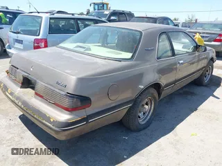 1987 Ford Thunderbird z VIN 1FABP6033HH213366, wystawiony jako IAAI lot #42368900 z przebiegiem Nie podano mil oraz . Historia ofert i sprzedaży dostępna na DreamBid. Obrazek 4.