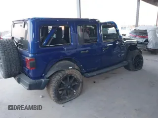 2018 Jeep Wrangler Unlimited Sahara z VIN 1C4HJXEN0JW274942, wystawiony jako IAAI lot #41175231 z przebiegiem 97 255 mil mil oraz . Historia ofert i sprzedaży dostępna na DreamBid. Obrazek 4.
