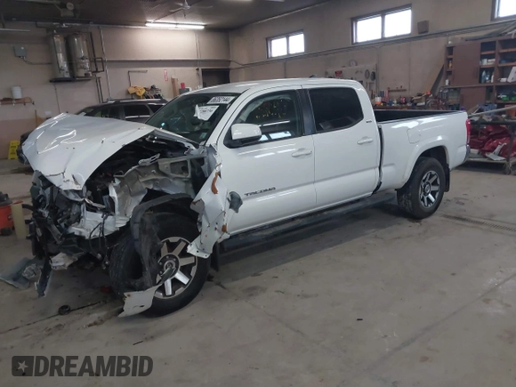 2016 Toyota Tacoma SR5 with VIN 3TMDZ5BN2GM007990, listed as a IAAI auction lot 41288736 with 76,179 mi miles. Bid and sale history available at carsss.com. Image 17.