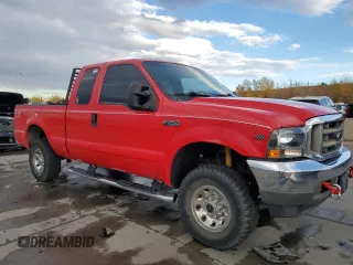 2002 Ford Super Duty F-250 XL with VIN 1FTNX21SX2EA75162, listed as a Copart auction lot 77799514 with 157,731 mi miles and Clean Title. Bid and sale history available at carsss.com. Image 4.