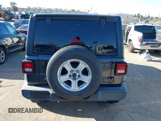 2018 Jeep Wrangler Unlimited Sport S z VIN 1C4HJXDG4JW132547, wystawiony jako IAAI lot #41838010 z przebiegiem 69 987 mil mil oraz . Historia ofert i sprzedaży dostępna na DreamBid. Obrazek 16.