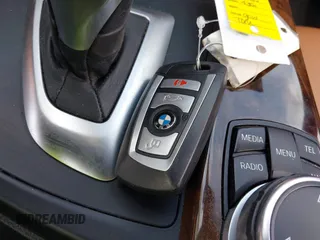 2015 BMW 4 Series 435i xDrive with VIN WBA3T7C51FP942320, listed as a IAAI auction lot 42059717 with 81,815 mi miles and . Bid and sale history available at DreamBid. Image 11.
