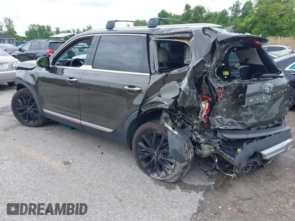 2020 Kia Telluride SX with VIN 5XYP5DHC8LG079664, listed as a IAAI auction lot 42222352 with 98,348 mi miles and . Bid and sale history available at DreamBid. Image 3.