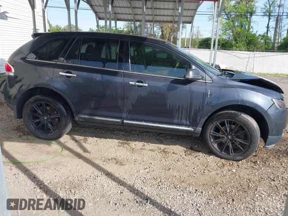 2014 Lincoln MKX with VIN 2LMDJ8JK9EBL16189, listed as a IAAI auction lot 42152268 with 215,862 mi miles and . Bid and sale history available at DreamBid. Image 14.