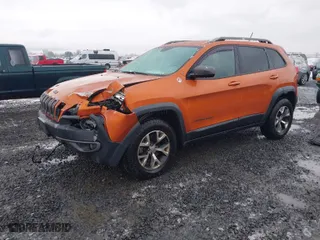 2015 Jeep Cherokee Trailhawk with VIN 1C4PJMBS5FW502185, listed as a IAAI auction lot 41535588 with 81,361 mi miles. Bid and sale history available at carsss.com. Image 2.