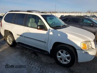 2005 GMC Envoy SLT with VIN 1GKDT13S452369908, listed as a Copart auction lot 49643375 with 0 mi miles and Salvage Title. Bid and sale history available at carsss.com. Image 4.