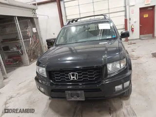 2014 Honda Ridgeline SE with VIN 5FPYK1F63EB013811, listed as a IAAI auction lot 41422016 with 168,653 mi miles. Bid and sale history available at carsss.com. Image 12.
