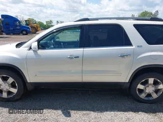 2010 GMC Acadia SLT1 z VIN 1GKLVMED9AJ175364, wystawiony jako IAAI lot #42266413 z przebiegiem 141 720 mil mil oraz . Historia ofert i sprzedaży dostępna na DreamBid. Obrazek 14.