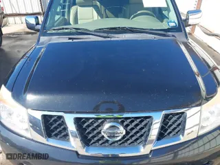 2015 Nissan Armada SV with VIN 5N1BA0ND0FN620176, listed as a IAAI auction lot 41665275 with 128,277 mi miles. Bid and sale history available at carsss.com. Image 6.