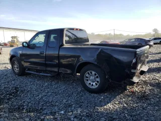2002 Ford F-150 XL with VIN 1FTRX17L42NB06983, listed as a Copart auction lot 54172855 with 150,243 mi miles and Salvage title. Bid and sale history available at DreamBid. Image 2.