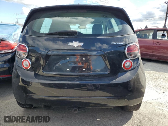 2013 Chevrolet Sonic LS with VIN 1G1JA6SG4D4239041, listed as a Copart auction lot 48250105 with 103,370 mi miles and Salvage title. Bid and sale history available at DreamBid. Image 6.