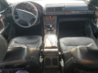 1995 Mercedes-Benz S with VIN WDBGA43E9SA233994, listed as a Copart auction lot 65867264 with 655,674 mi miles and Salvage Title. Bid and sale history available at DreamBid. Image 8.