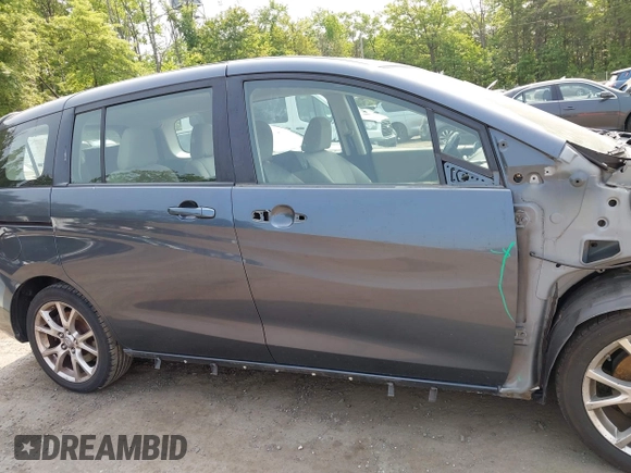2012 Mazda 5 Touring z VIN JM1CW2CL5C0126744, wystawiony jako IAAI lot #42385667 z przebiegiem 140 150 mil mil oraz . Historia ofert i sprzedaży dostępna na DreamBid. Obrazek 13.