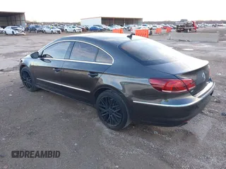 2015 Volkswagen CC Lux with VIN WVWRP7AN9FE819154, listed as a IAAI auction lot 41669832 with 151,142 mi miles. Bid and sale history available at carsss.com. Image 3.