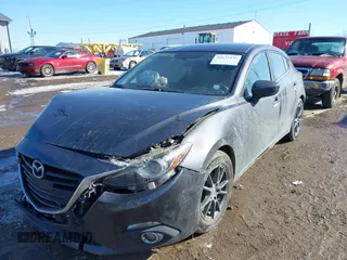 2014 Mazda 3 S Touring with VIN JM1BM1L36E1109332, listed as a IAAI auction lot 41635456 with 180,146 mi miles and . Bid and sale history available at DreamBid. Image 2.