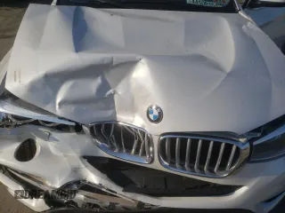 2015 BMW X4 xDrive28i with VIN 5UXXW3C59F0F89503, listed as a Copart auction lot 44500354 with 141,431 mi miles. Bid and sale history available at carsss.com. Image 12.