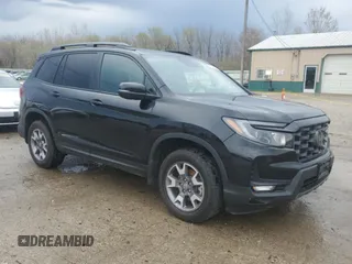 2023 Honda Passport TrailSport with VIN 5FNYF8H65PB040661, listed as a Copart auction lot 52137585 with 32,100 mi miles and Salvage Title. Bid and sale history available at carsss.com. Image 4.