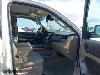 2015 Chevrolet Tahoe LTZ with VIN 1GNSCCKC4FR142856, listed as a IAAI auction lot 39886899 with 134,301 mi miles. Bid and sale history available at carsss.com. Image 5.