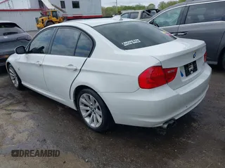 2011 BMW 3 Series 328i xDrive with VIN WBAPK7C58BA820717, listed as a IAAI auction lot 42080003 with 213,034 mi miles. Bid and sale history available at carsss.com. Image 3.