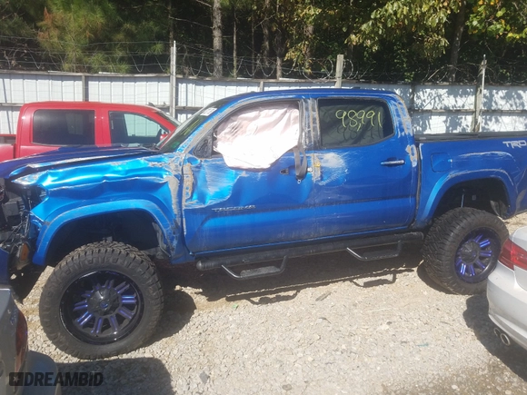 2016 Toyota Tacoma SR with VIN 5TFCZ5ANXGX018193, listed as a Copart auction lot 52271750 with 98,991 mi miles and Salvage Title. Bid and sale history available at carsss.com. Image 9.