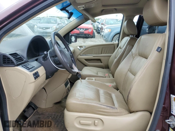 2010 Honda Odyssey Touring with VIN 5FNRL3H94AB056657, listed as a Copart auction lot 72658934 with 202,690 mi miles and Salvage title. Bid and sale history available at DreamBid. Image 7.