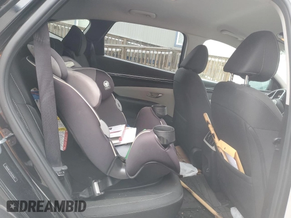 2023 Hyundai Tucson SEL with VIN 5NMJBCAE2PH270674, listed as a Copart auction lot 82879614 with 11,673 mi miles and Salvage Title. Bid and sale history available at DreamBid. Image 11.