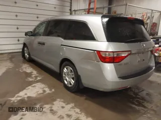 2012 Honda Odyssey LX with VIN 5FNRL5H27CB092988, listed as a IAAI auction lot 41933507 with 123,233 mi miles and . Bid and sale history available at DreamBid. Image 3.