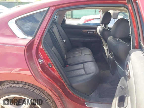 2014 Nissan Altima SL with VIN 1N4BL3AP9EC427296, listed as a IAAI auction lot 42709463 with 64,919 mi miles and . Bid and sale history available at DreamBid. Image 8.