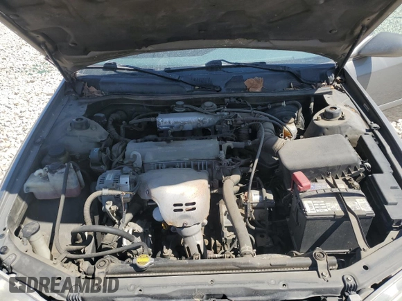 2000 Toyota Camry CE z VIN 4T1BG22K3YU009533, wystawiony jako Copart lot #48996855 z przebiegiem 132 705 mil mil oraz Szkoda całkowita • Salvage title. Historia ofert i sprzedaży dostępna na DreamBid. Obrazek 13.