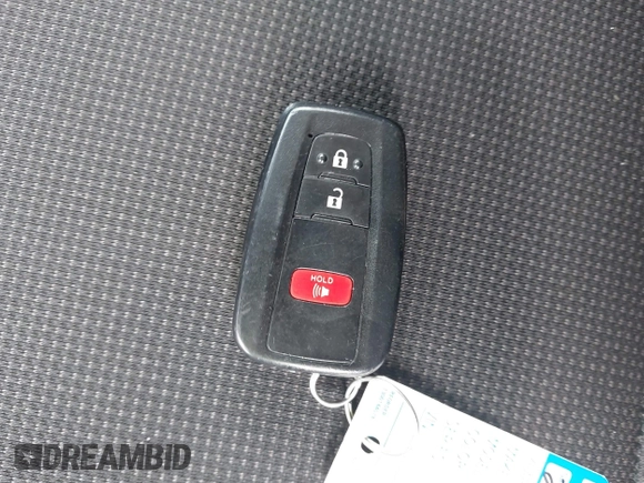 2021 Toyota Prius L Eco z VIN JTDKAMFU3M3152785, wystawiony jako IAAI lot #42501351 z przebiegiem 60 489 mil mil oraz . Historia ofert i sprzedaży dostępna na DreamBid. Obrazek 11.