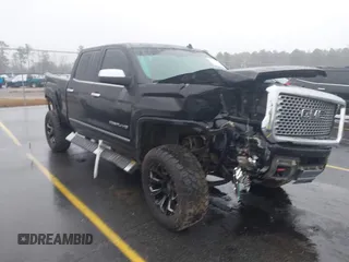 2015 GMC Sierra 2500HD available WiFi Denali with VIN 1GT120E89FF193669, listed as a IAAI auction lot 41556681 with 268,439 mi miles. Bid and sale history available at carsss.com. Image 1.