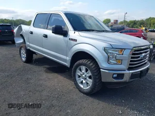 2015 Ford F-150 XL with VIN 1FTEW1CF0FFA40966, listed as a IAAI auction lot 40277006 with 156,433 mi miles. Bid and sale history available at carsss.com. Image 1.