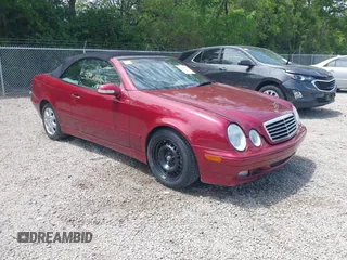 2002 Mercedes-Benz CLK 320/430 z VIN WDBLK65G62T118893, wystawiony jako IAAI lot #42300653 z przebiegiem 93 823 mil mil oraz . Historia ofert i sprzedaży dostępna na DreamBid. Obrazek 1.