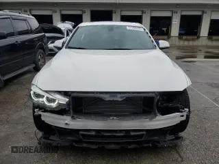 2018 BMW 3 Series 330i xDrive with VIN WBA8D9G50JNU66803, listed as a Copart auction lot 57295225 with 38,967 mi miles and Salvage title. Bid and sale history available at DreamBid. Image 5.