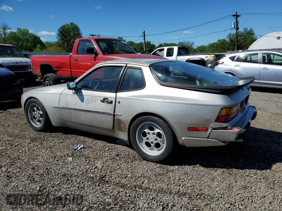 1986 Porsche 944 z VIN WP0AA0954GN155776, wystawiony jako Copart lot #56032785 z przebiegiem 17 696 mil mil oraz Szkoda całkowita • Salvage title. Historia ofert i sprzedaży dostępna na DreamBid. Obrazek 2.