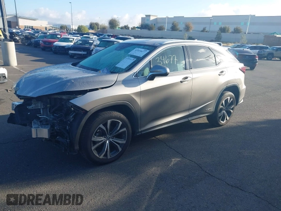 2022 Lexus RX 450h с VIN 2T2HGMDA0NC074486, выставлен на аукционе IAAI как лот 41434677 с пробегом 50 955 миль миль и . История ставок и продаж доступна на DreamBid. Изображение 2.