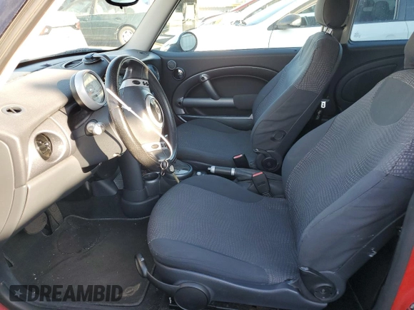 2004 MINI Hardtop with VIN WMWRC33474TJ53569, listed as a Copart auction lot 72429454 with 154,713 mi miles and Salvage Title. Bid and sale history available at DreamBid. Image 7.